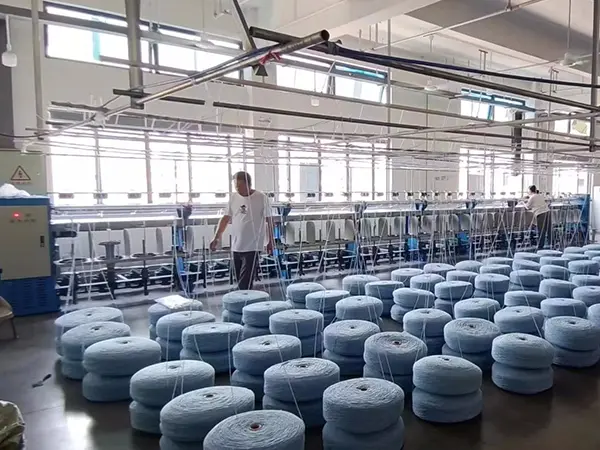 Processo de produção de fios de algodão